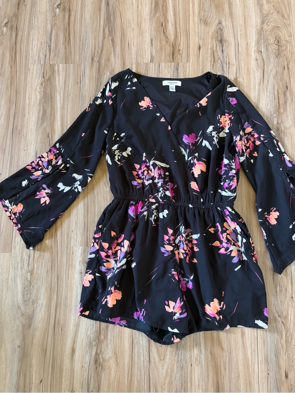 Black Floral Wrap-Style Romper with Pink & Purple Blooms